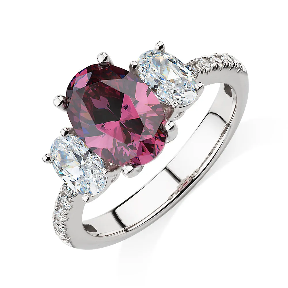 Dress ring with rhodolite simulant and 1.01 carats* of diamond simulants in sterling silver