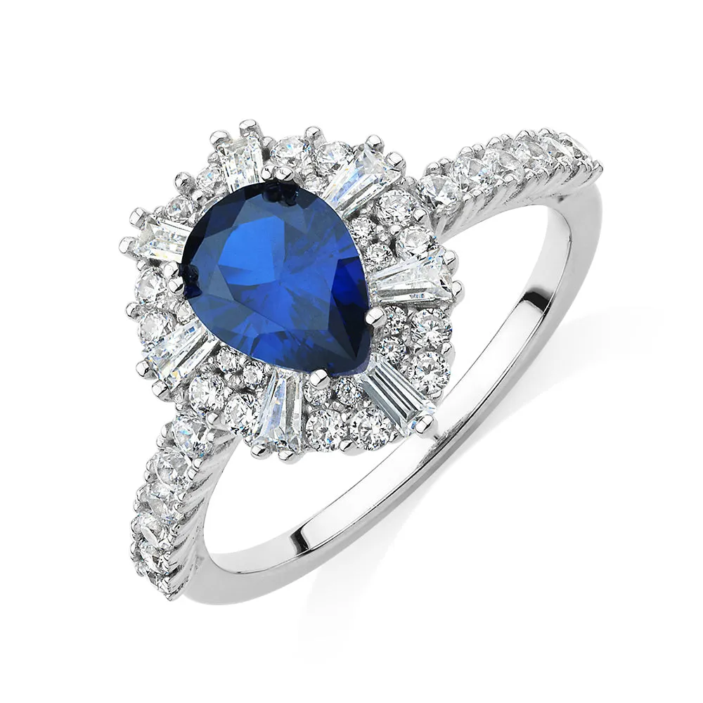 Dress ring with sapphire simulant and 0.86 carats* of diamond simulants in sterling silver