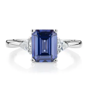 Dress ring with tanzanite simulant and 0.32 carats* of diamond simulants in sterling silver