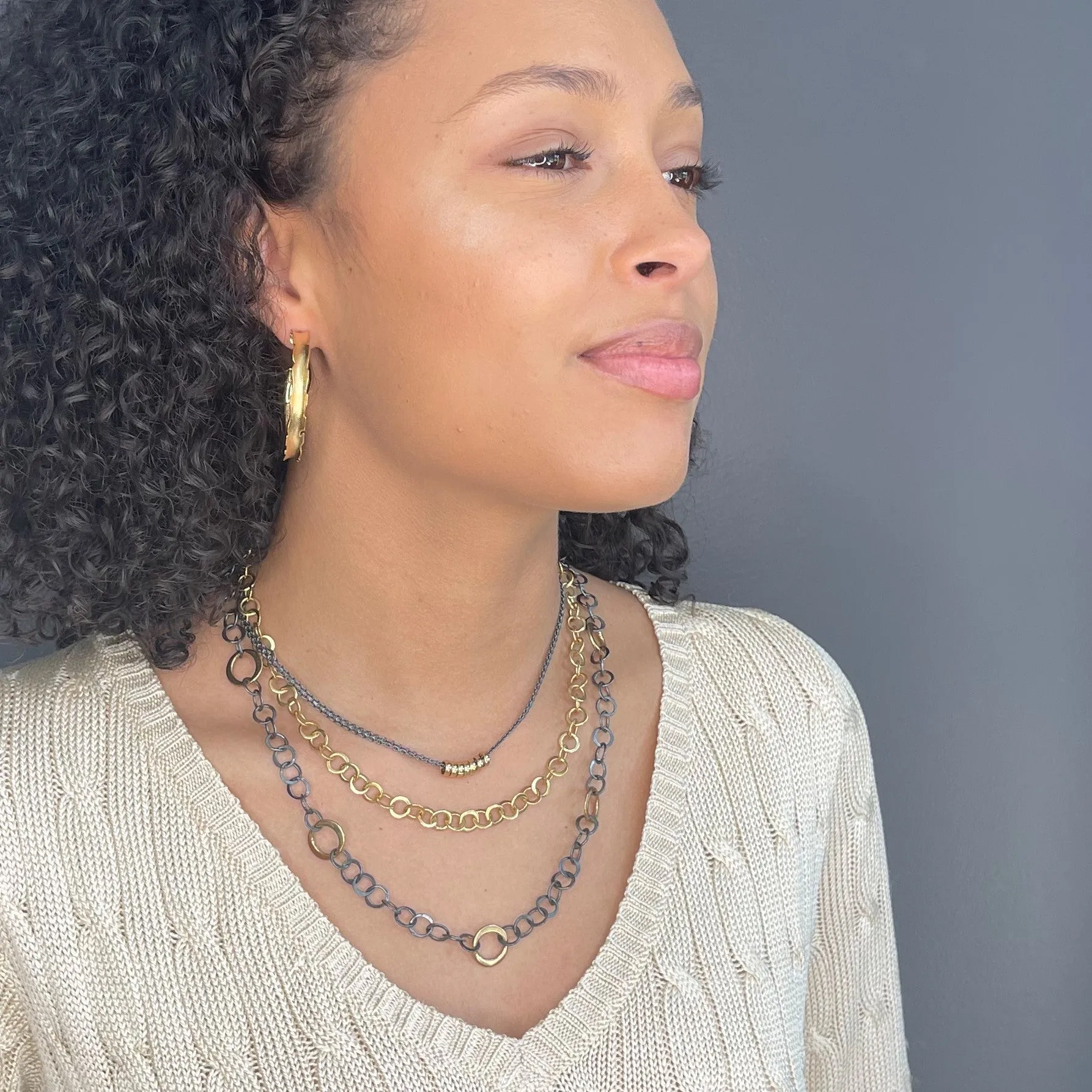 Gold Ringlets on Woven Chain